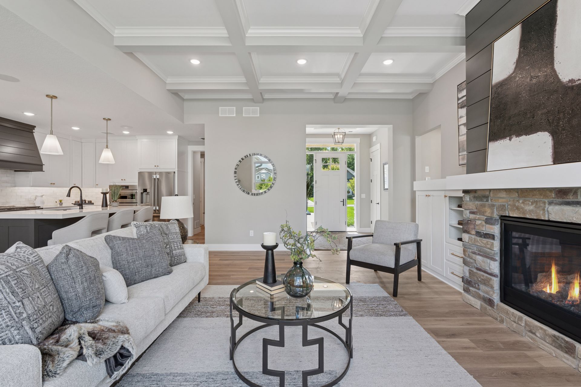 Open concept layout with sightline from great room to entryway