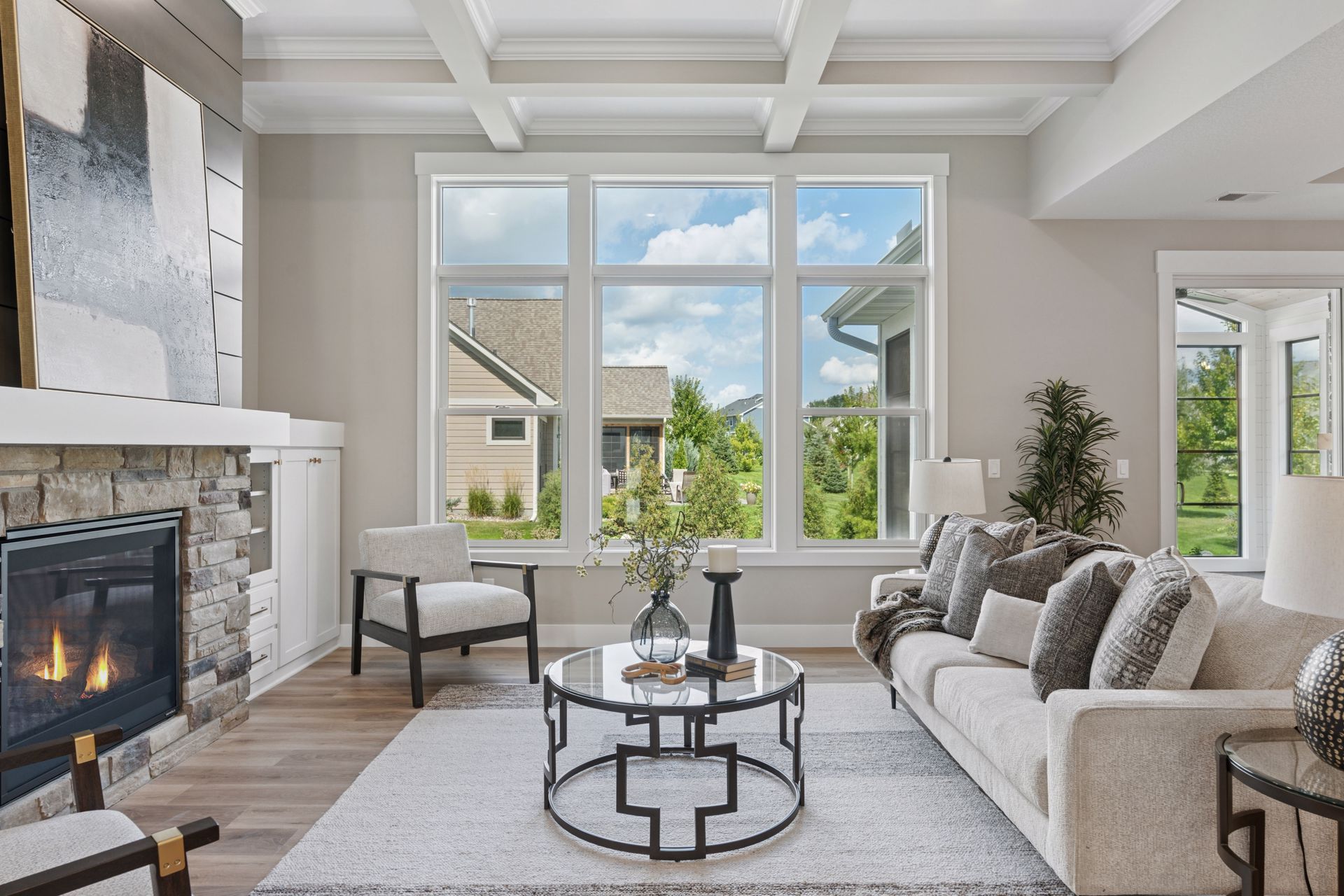 Great room with expansive triple window for natural light and scenery