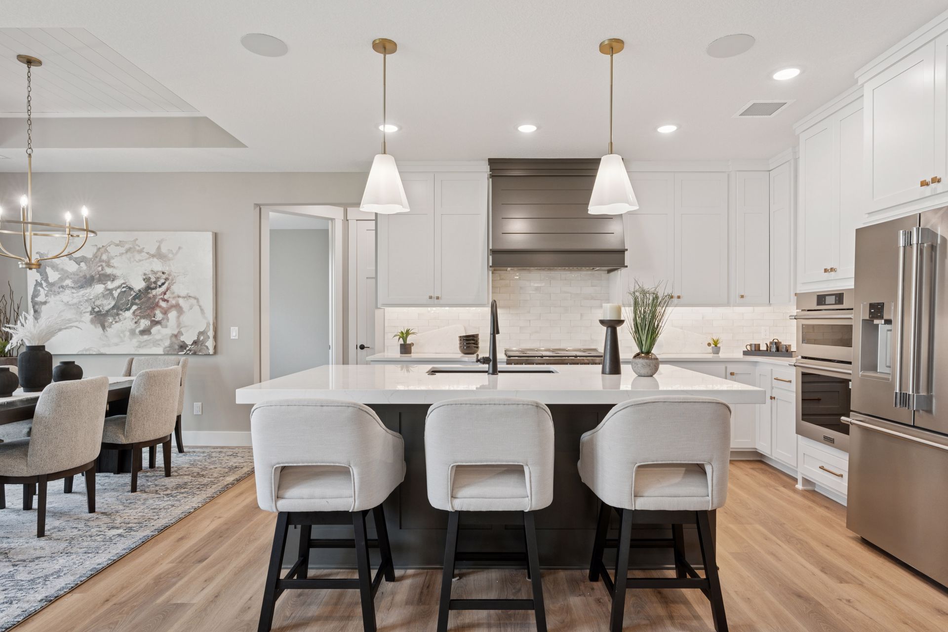 Spacious island featuring bar seating for three stools