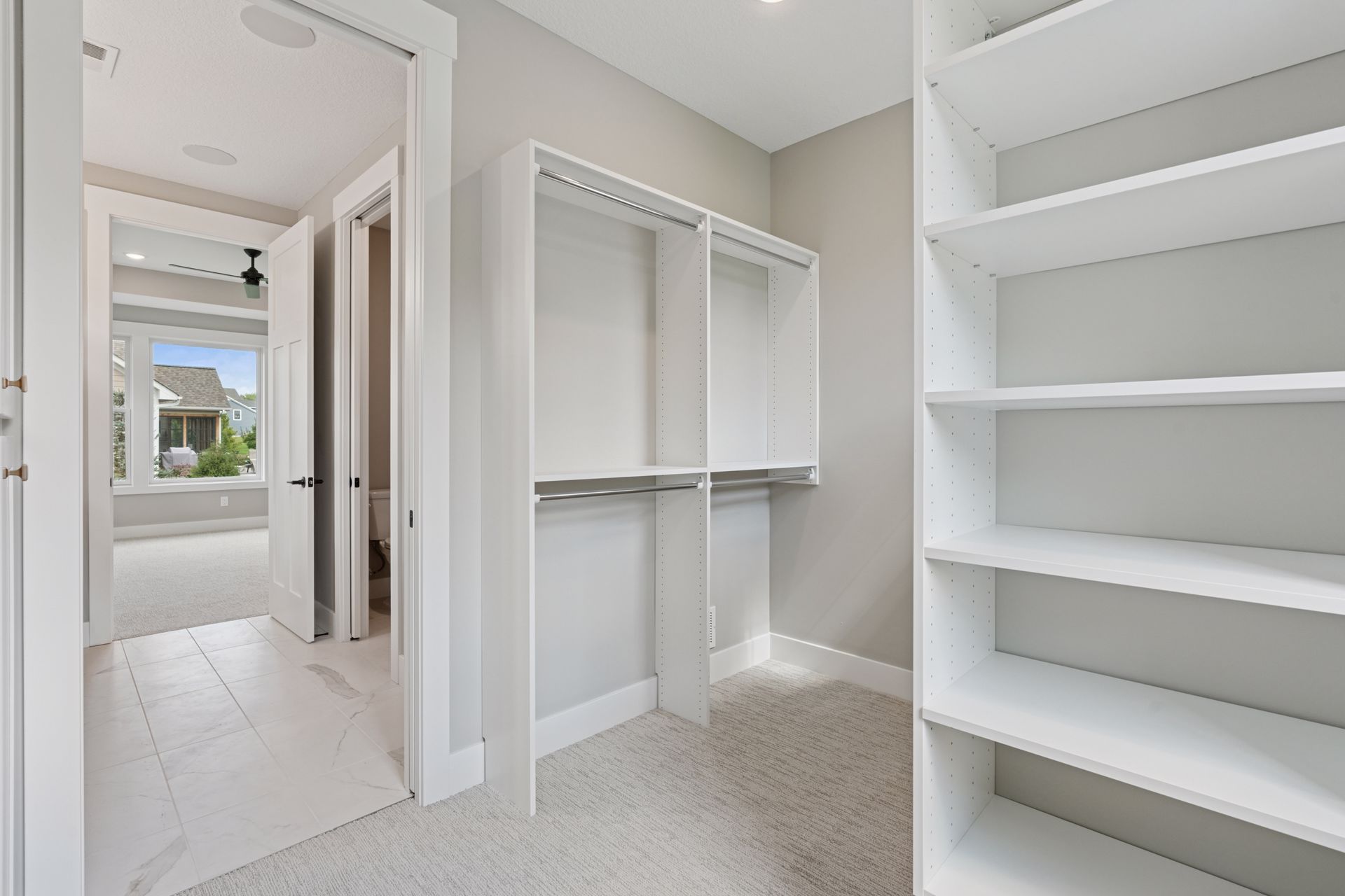 Extra-large walk-in closet with custom built-in organizers