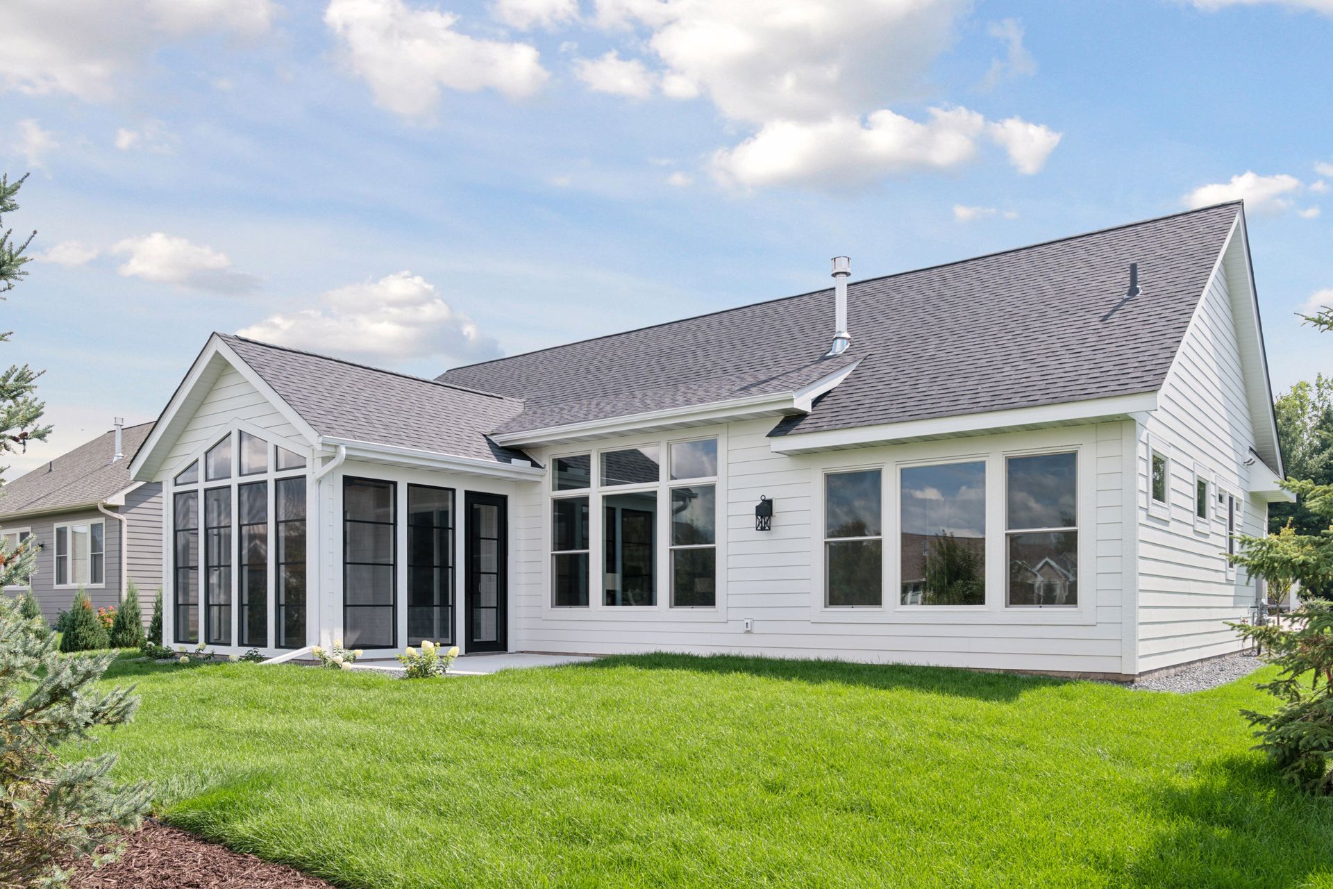 Rear exterior of home with outdoor living space